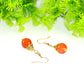 Close up of 12mm Natural Carnelian Crystal Drop Earrings.