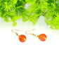 Close up of 12mm Natural Carnelian Crystal Drop Earrings.