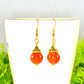 Close up of 12mm Natural Carnelian Crystal Drop Earrings.