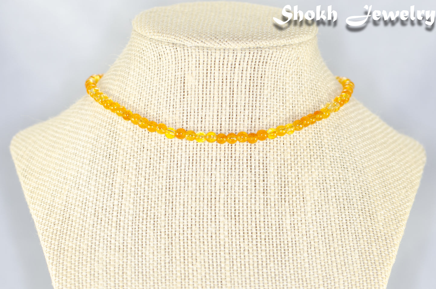 4mm Citrine Crystal Choker Necklace displayed on a bust.