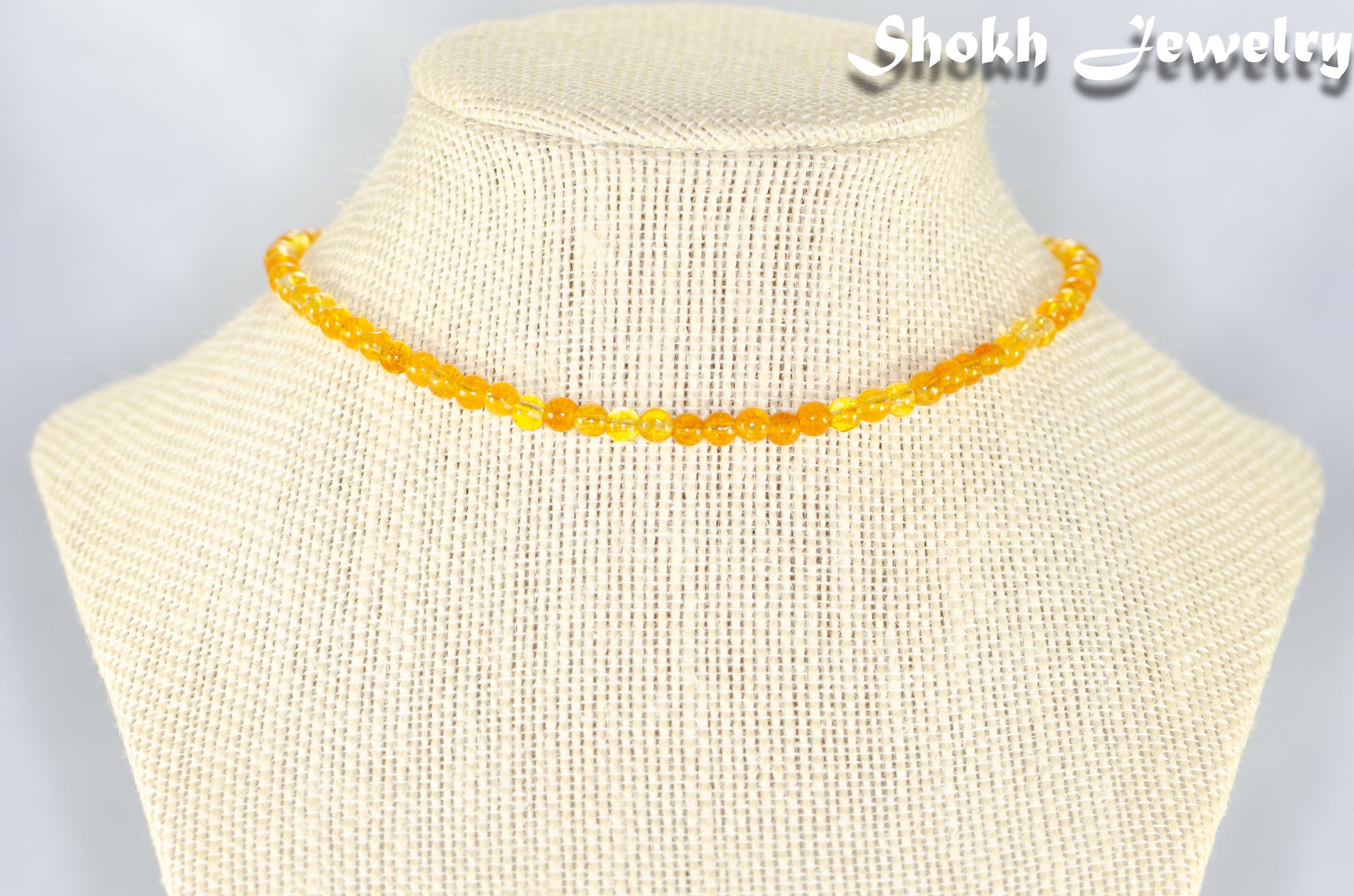 4mm Citrine Crystal Choker Necklace displayed on a bust.