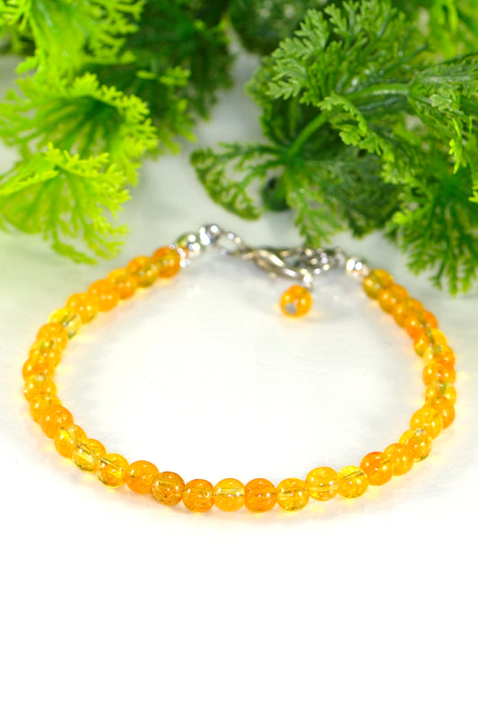 Natural Citrine Anklet made with 4mm natural citrine beads strung on sturdy bead stringing wire, finished with a lobster clasp.