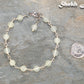 6mm Green Jade Link Anklet beside a dime.