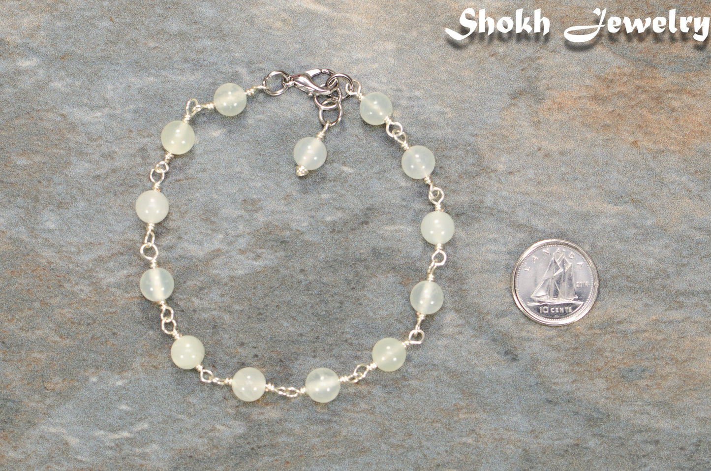 6mm Green Jade Link Anklet beside a dime.