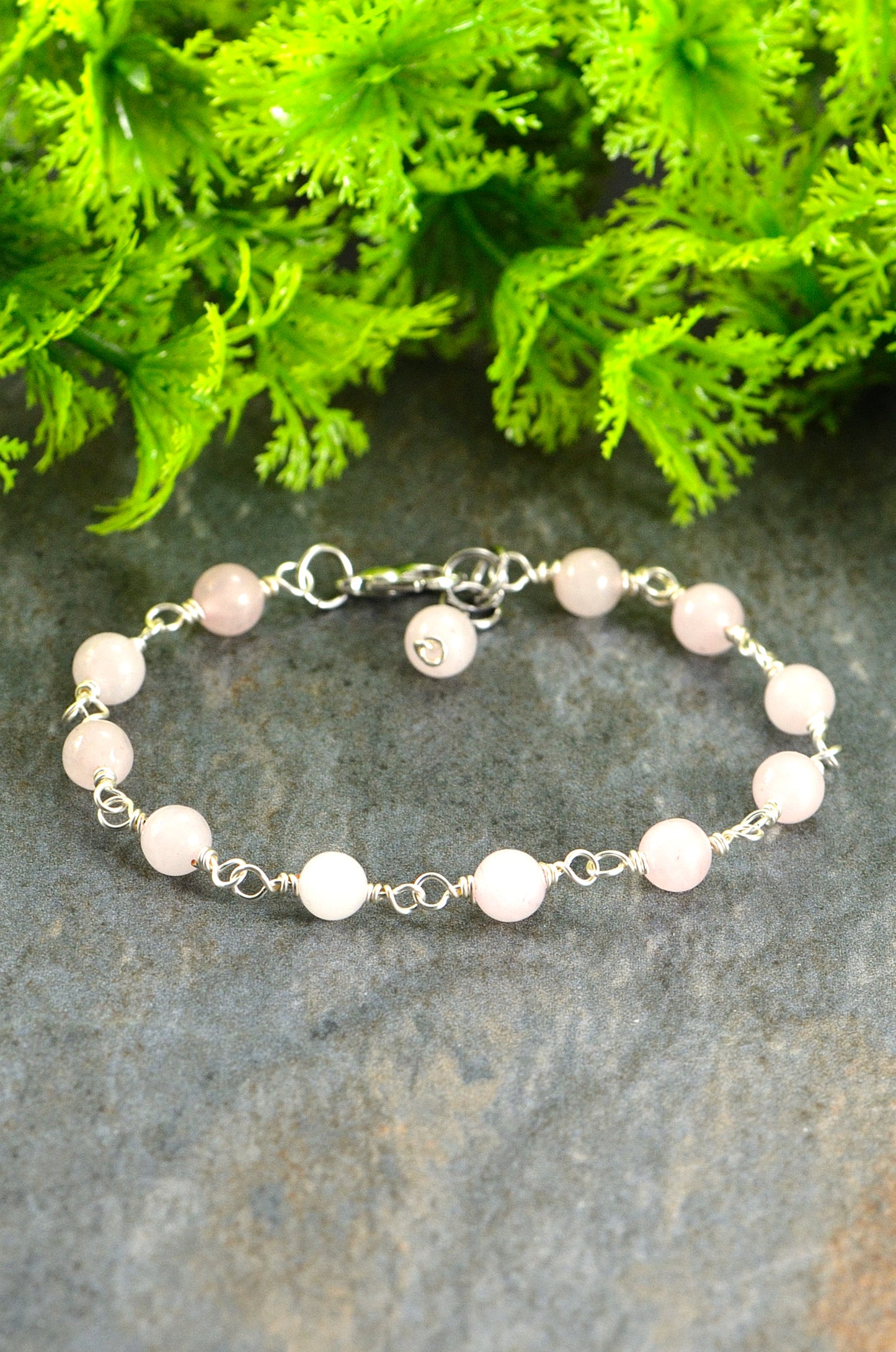 Close up of 6mm Rose Quartz Link Bracelet.