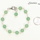8mm Green Aventurine Link Anklet beside a dime.