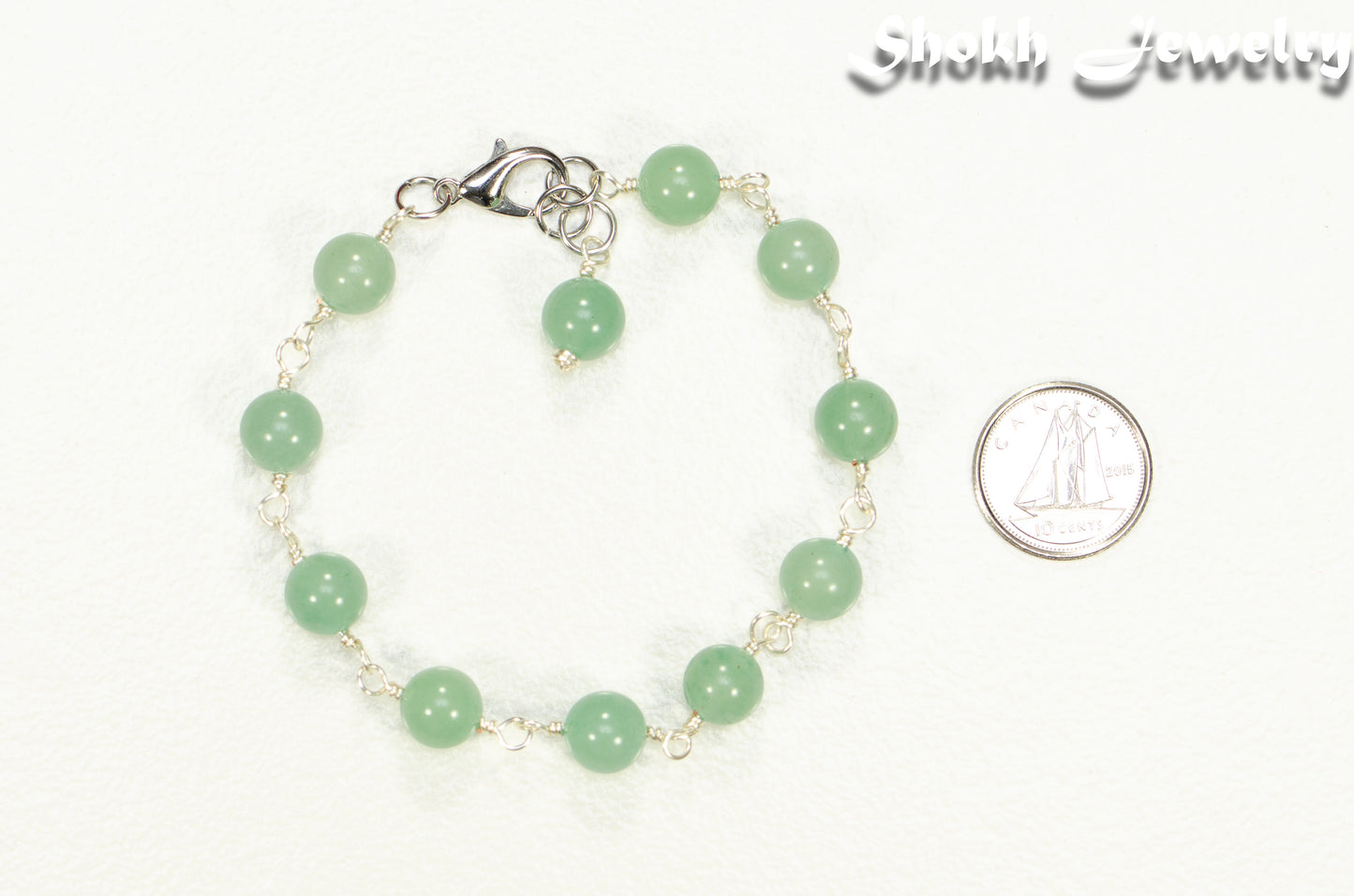8mm Green Aventurine Link Anklet beside a dime.