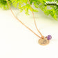 Close up of Rose Gold Plated February Birth Flower Necklace with Amethyst Birthstone Pendant.
