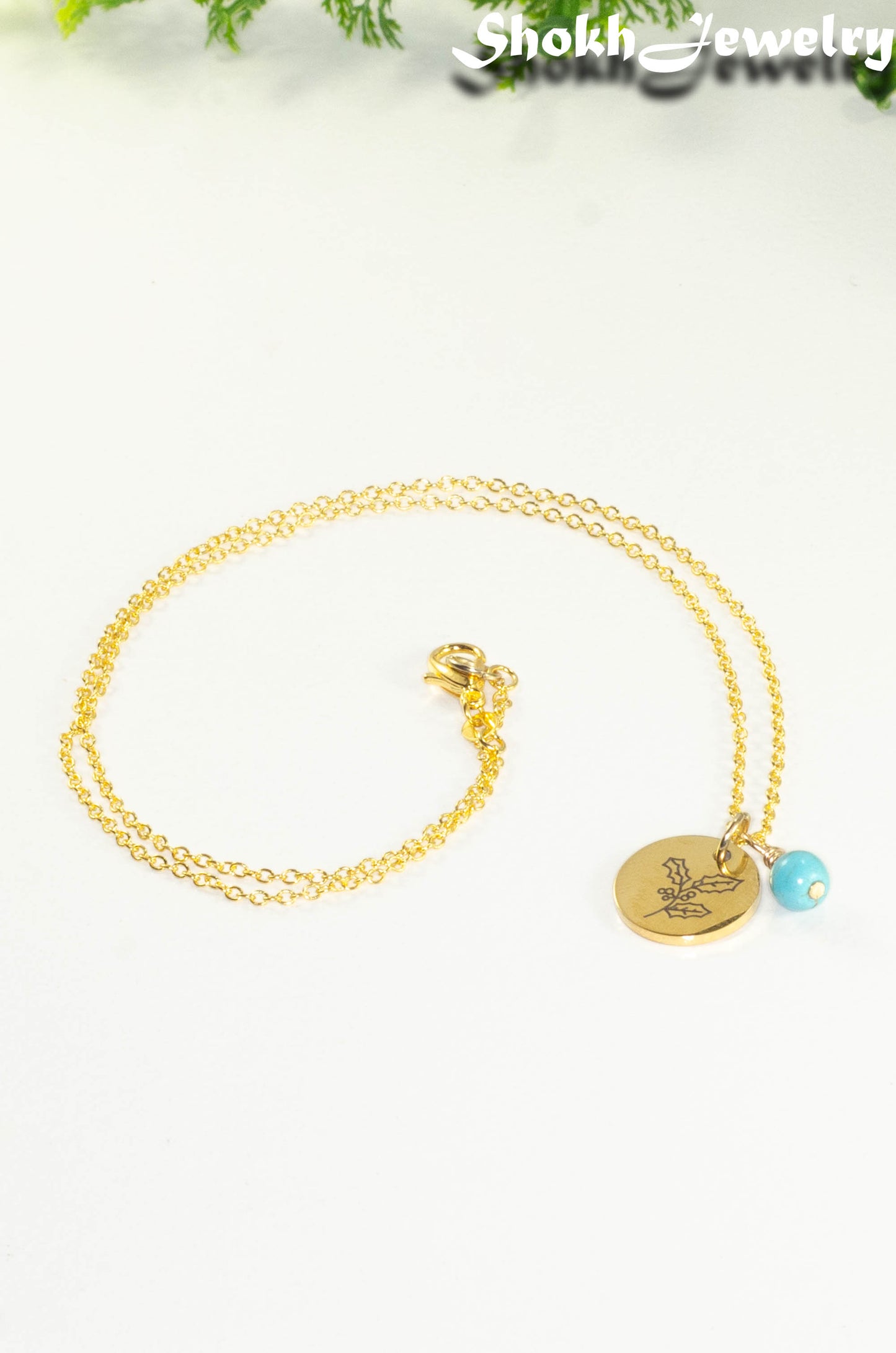 Gold Plated December Birth Flower Necklace with Turquoise Howlite Birthstone Pendant.