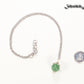 12mm Green Aventurine Pendant Necklace beside a dime.