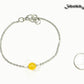 8mm Citrine and Chain Anklet beside a dime.
