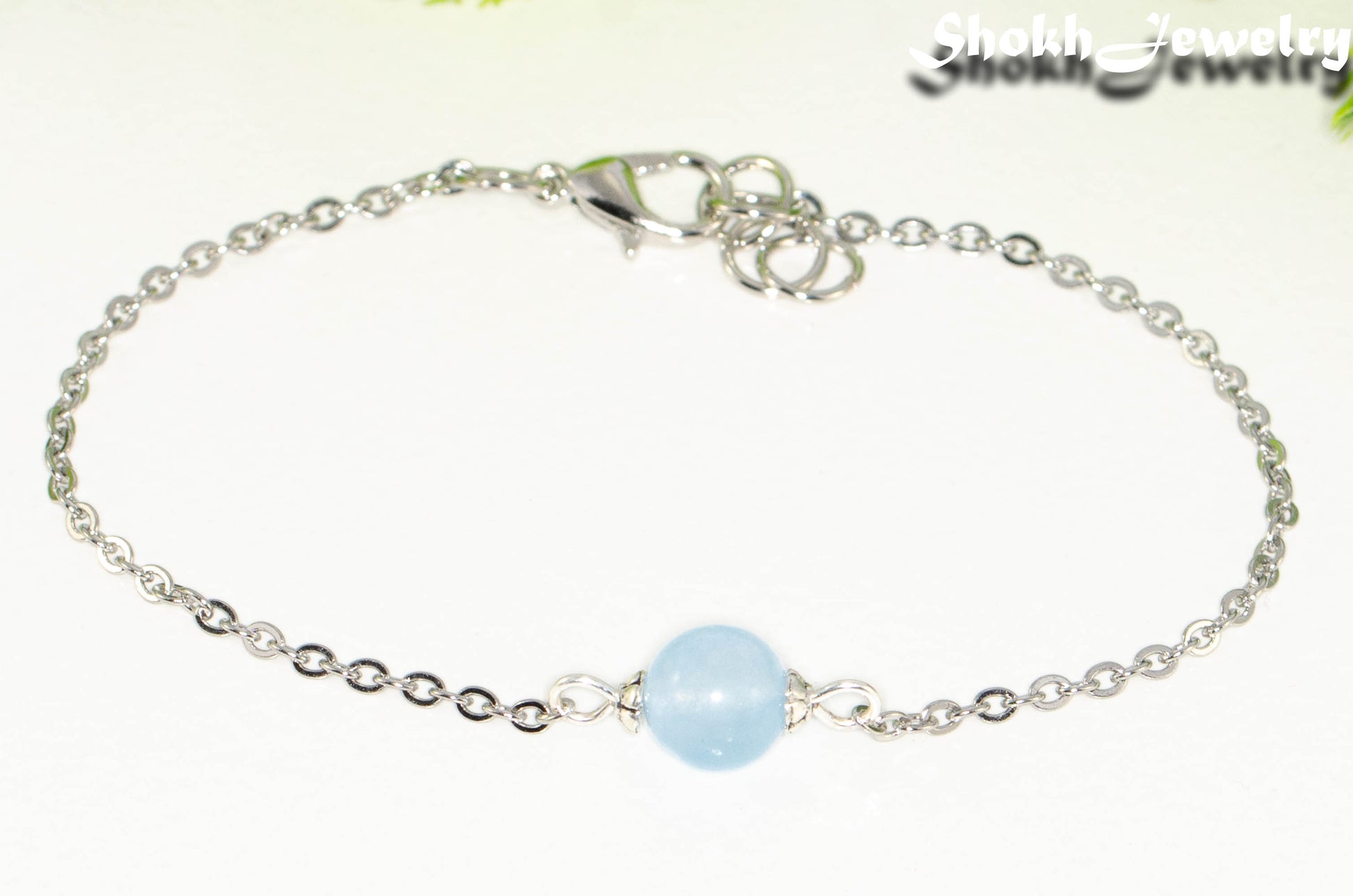 Close up of 8mm Aquamarine and Chain Anklet.