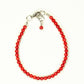 Top view of 4mm Natural Red Coral Bracelet with Clasp.