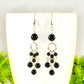 Close up of Statement Black Obsidian Chandelier Earrings.