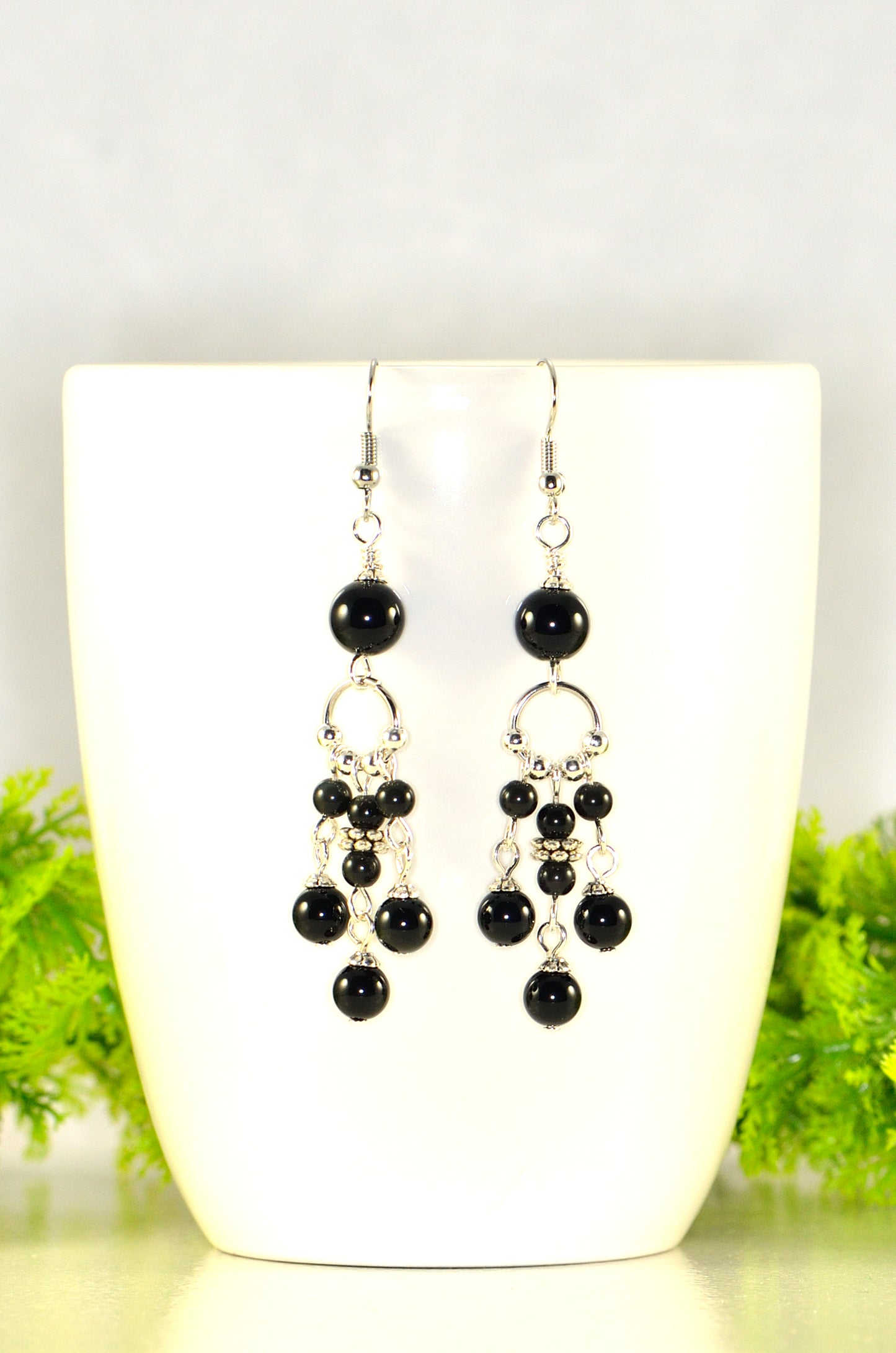 Close up of Statement Black Obsidian Chandelier Earrings.