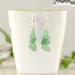 Natural Green Aventurine Crystal Chip Earrings on a tea cup