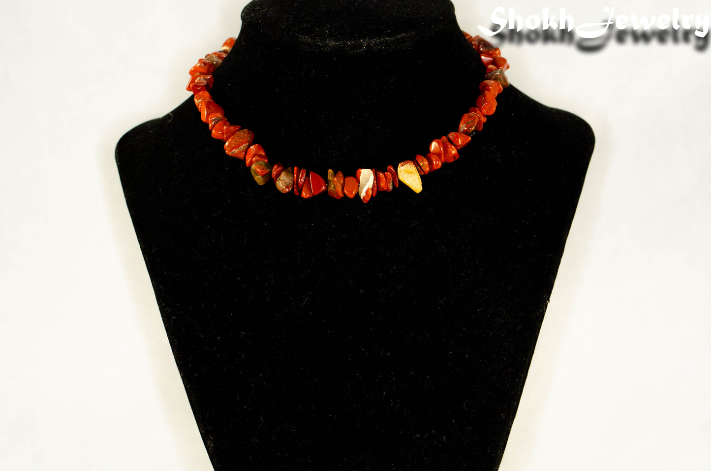 Natural Red Jasper Crystal Chip Choker Necklace displayed on a bust