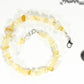 Natural Citrine Crystal Chip Choker Necklace beside a dime