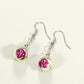 Top view of 12mm Ceramic Pink Flower Earrings