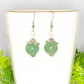 12mm Natural Green Aventurine Crystal Earrings on a tea cup