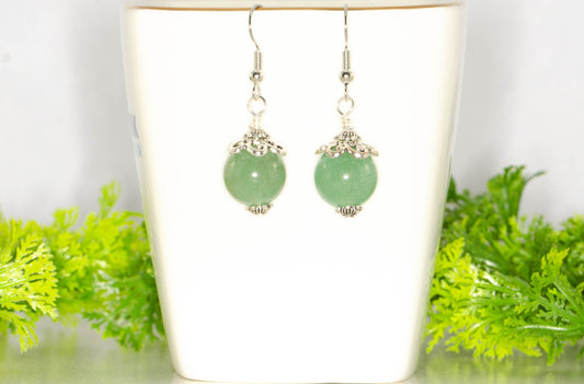 12mm Natural Green Aventurine Crystal Earrings on a tea cup