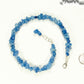 Natural Blue Quartzite Crystal Chip Choker Necklace beside a dime